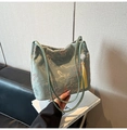 Detail of light green satin bucket bag with Chinese embroidery and yellow tassels - Green with Pendant / Green