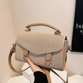Beige woven crossbody square bag with brown leather trim and handle details - Khaki