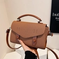 Brown woven fashion handbag for women with adjustable crossbody strap and silver accents - Biscuit