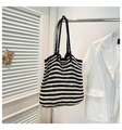 Detail of knit tote bag with black and white stripes and crochet texture on hanger - Black with Pendant