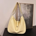 Minimalist cream yellow faux leather hobo bag with wide strap and magnetic metal buckle - Yellow