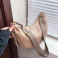 Litchi pattern leather dumpling bag in light khaki with wide colorful jacquard strap - Khaki
