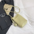 Minimalist light green lychee leather mobile phone crossbody bag with decorative pompom - Yellow