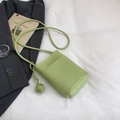 Mini green crossbody phone bag in pebble grain leather with braided knot strap - Green