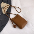 Minimalist brown litchi pattern mini crossbody bag with knotted strap detail - Brown