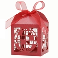 Detail of red laser-cut candy box with globe pattern and matching chiffon ribbon bow - Pearlescent Red