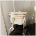 Chic cream white leather bucket bag with silver hardware and adjustable shoulder strap - Off White