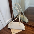 Borsa a spalla minimalista in pelle crema a forma di conchiglia con fiocco laterale - Bianco Grande