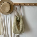Pale green woven knit tote bag with dark brown leather strap and hollow pattern - Green