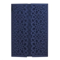 Detail showing laser-cut dark blue floral lace design on elegant wedding invitation cover - Magic Blue