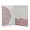 Detail of laser-cut glitter paper wedding invitation with intricate mandala patterns - Glitter Pink