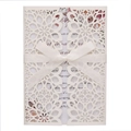 Laser-cut white glitter wedding invitation with floral pattern and satin ribbon bow - Glitter Ivory