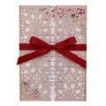 Detail of rose gold glitter wedding invitation with laser-cut hollow pattern and red silk bow - Apple Gold