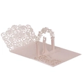 Detail of laser-cut 3D pop-up wedding card featuring a romantic floral arch and couple - Nude Pink