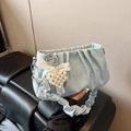 Light blue pleated shoulder bag with glossy finish and pearl heart charm accessory - Blue
