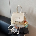 Mini backpack in cream leather and straw weave with a cute cartoon charm - Beige With Charm