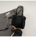 Chic black lychee texture leather mini bucket bag with knotted handle and shoulder strap - Black (Without Charm)