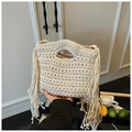 Beige hand-woven knit tote bag with long tassels in a trendy bohemian vacation style - White