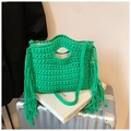 Emerald green hand-knitted handbag with fringe tassels and woven shoulder strap - Green
