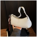 Detail of white half-moon underarm bag with woven rope accent and silver metal buckle - Red with Pendant