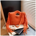 Summer knit crossbody bag in bright orange with bohemian fringes and round handle - Orange
