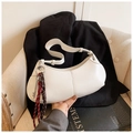 Detail of white half-moon hobo bag with litchi texture and silver key charm - White with Pendant