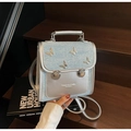 Mini sac à dos mode argenté et bleu clair avec détails papillons pour femme - Bleu Ciel