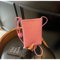 Pink lychee grain leather crossbody phone bag with handmade woven sphere knots - Pink