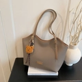 Elephant grey tote bag in lychee pattern leather with a cute brown bear pendant charm - Gray With Pendant