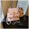 Pink drawstring bucket backpack with floral bear prints and litchi leather texture - Pink