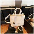 Sac seau blanc crème avec texture litchi, doubles poignées et bandoulière - Blanc