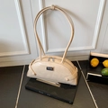 Chic beige shoulder bag with crocodile texture and sleek bowling-style crescent shape - Khaki