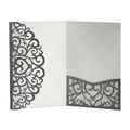 Detail of laser-cut glitter paper invitation with heart pattern and scrollwork - Charcoal Silver