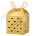 Detail of laser-cut heart pattern on gold favor box with elegant satin ribbon bow - Gold