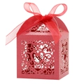 Detail of red laser-cut heart pattern gift box with elegant chiffon ribbon bow - Pearlescent Red