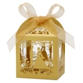 Detail of gold laser-cut wedding favor box with glitter texture and satin ribbon bow - Gold