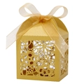 Close-up of golden laser-cut wedding favor box with pearl paper and ribbon bow - 5*5*8CM / Gold