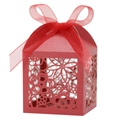 Detail of red laser-cut candy box featuring floral patterns and a matching satin ribbon bow - 5*5*8CM / Pearlescent Red