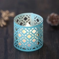 Hollow geometric light blue candle shade with warm LED electronic tea light candle - Tiffany Blue