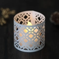 Laser-cut white paper lantern lampshade with warm LED candle light on wooden table - White