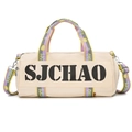 Sac de voyage beige minimaliste avec lettrage noir et bandoulière tissée colorée - Beige avec violet