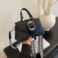 Black litchi pattern handbag with silver buckle and geometric fabric shoulder strap - Black