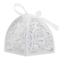 Detail of laser-cut rose patterns on white wedding candy box with a silk ribbon bow - White