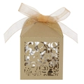 Detail of laser-cut number 18 candy box with floral patterns and a gold ribbon bow - Beige Gold
