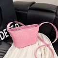 Chic pink leather woven crossbody bag with classic Intrecciato texture and top zipper - Pink