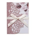 Detail of pink glitter laser-cut wedding invitation with hollow rose and satin bow - Pink