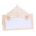 Macro detail of laser-cut lace pattern on pink pearlescent paper wedding place card - Jade Pearl