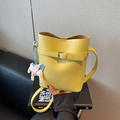 Bright yellow lychee leather bucket bag with Pegasus charm and adjustable shoulder strap - Yellow (With Pegasus Charm)