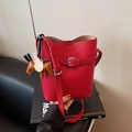 Red lychee grain leather bucket bag with horse charm and adjustable strap detail - Red (With Pegasus Charm)