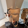 Chic beige lychee textured bucket bag with brown horse charm and adjustable strap - Khaki (With Pegasus Charm)